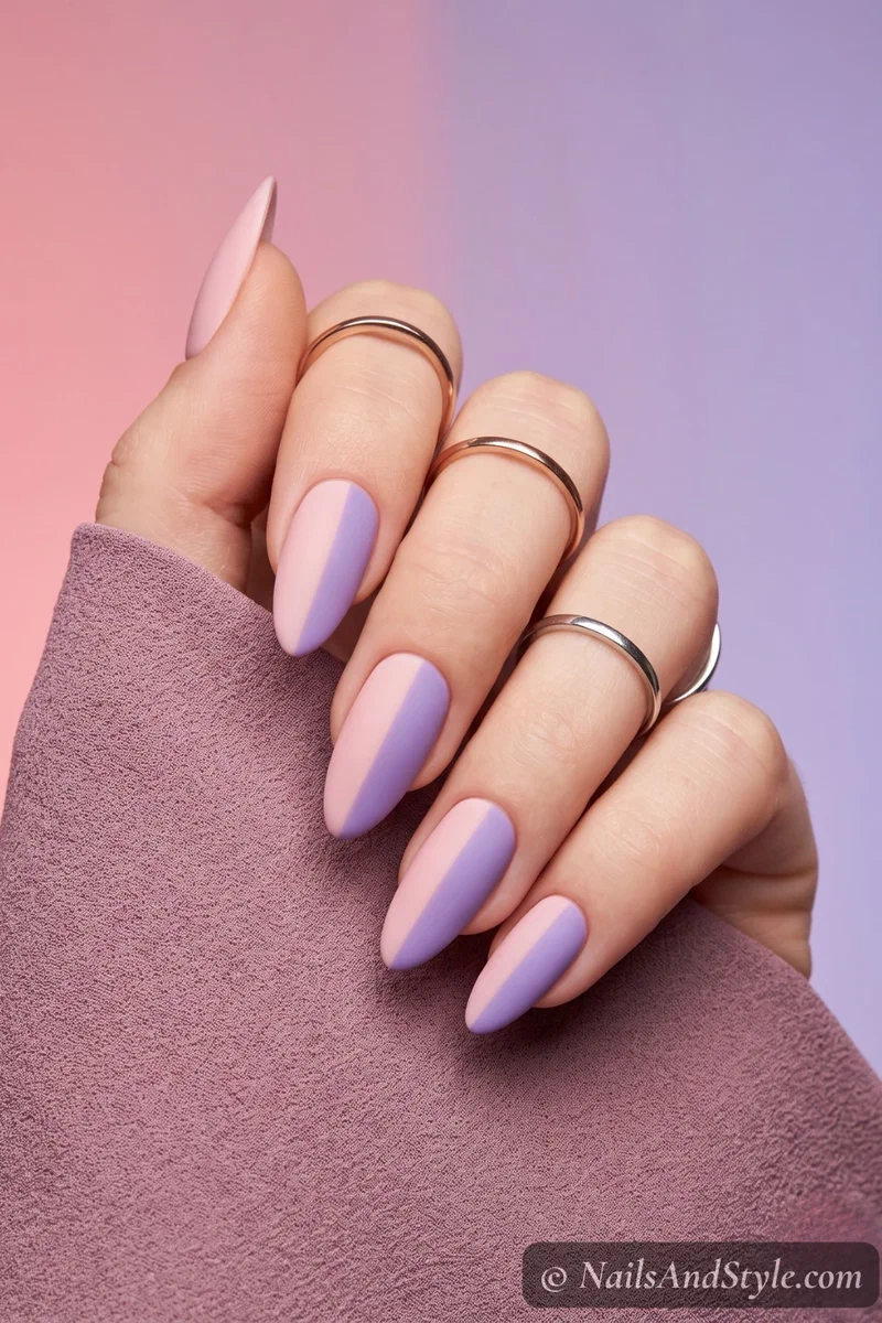 Split nails with blush pink on one half and lavender on the other