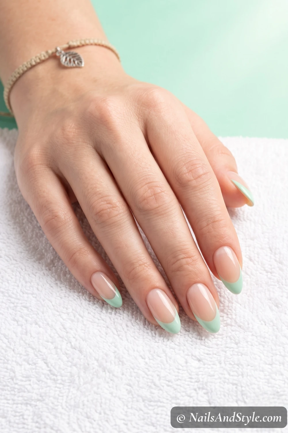 Mint green French tip nails