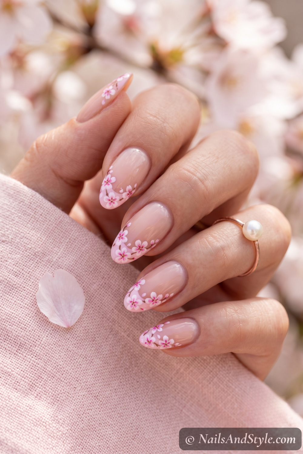 Pink cherry blossom French tip nails