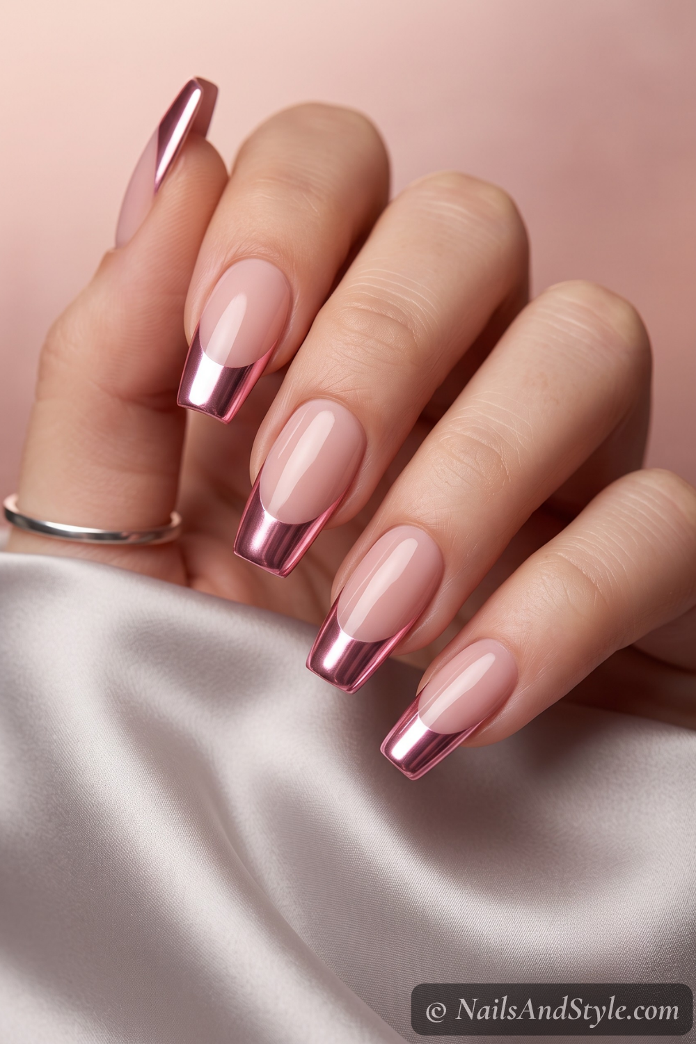 Pink chrome French tip nails