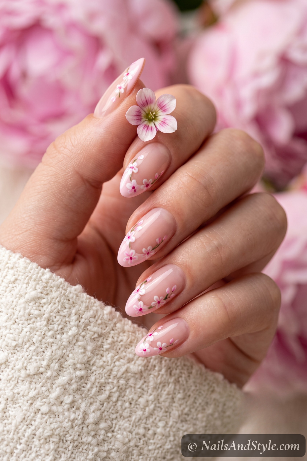 Pink floral French tip nails
