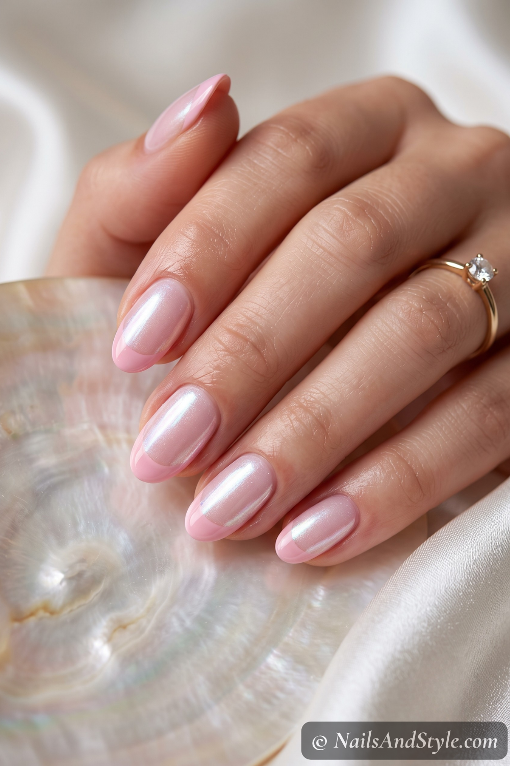 Glazed pink French tip nails