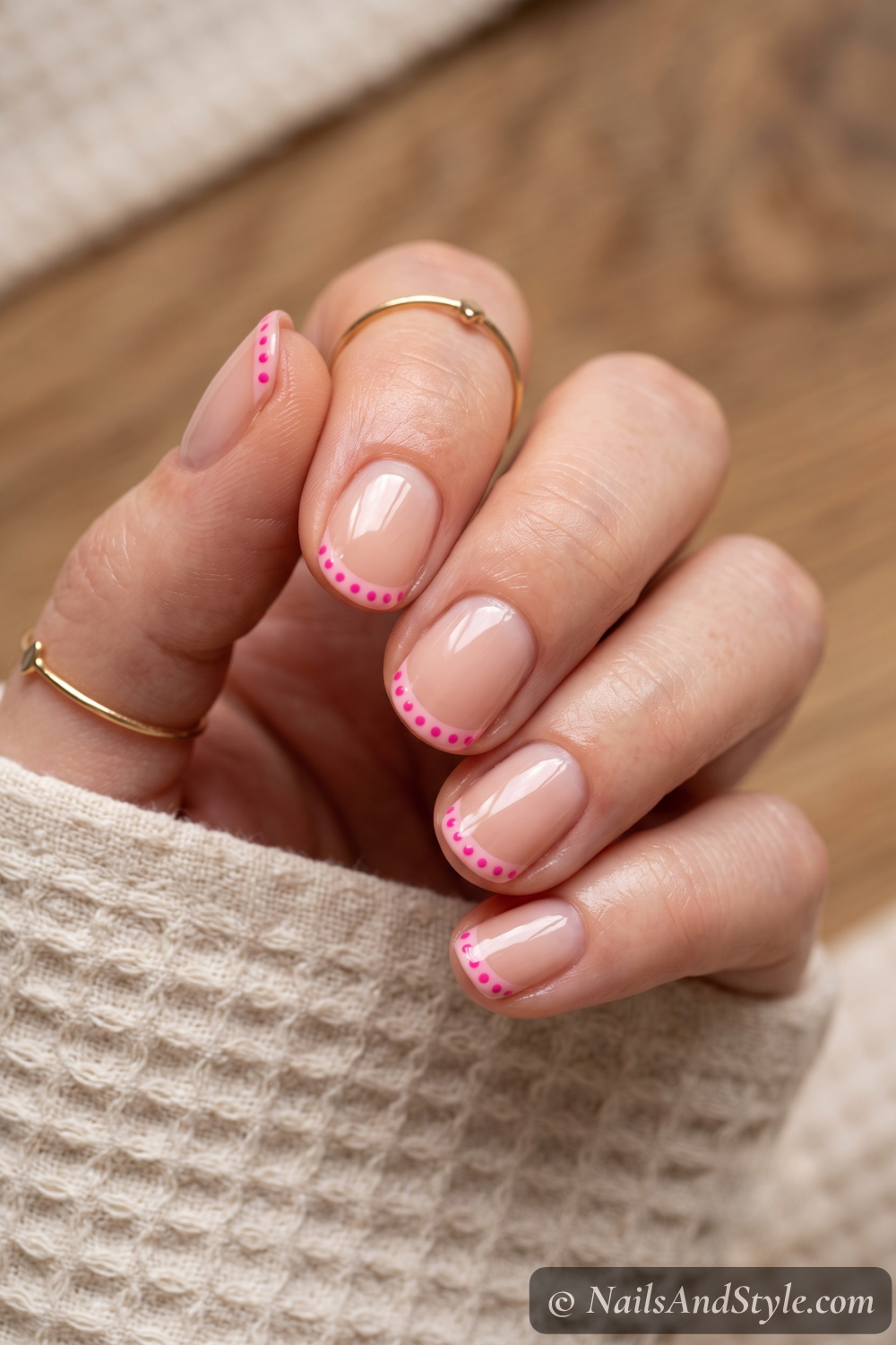Pink micro-dot French tip nails