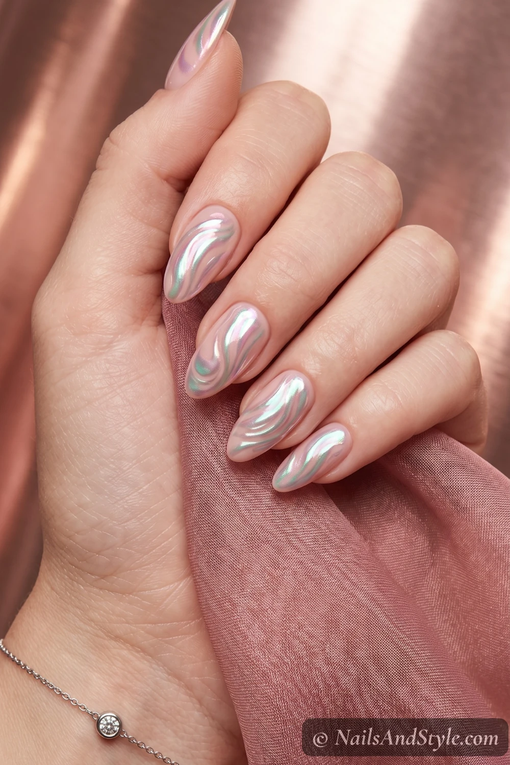 Chrome seashell swirl nails