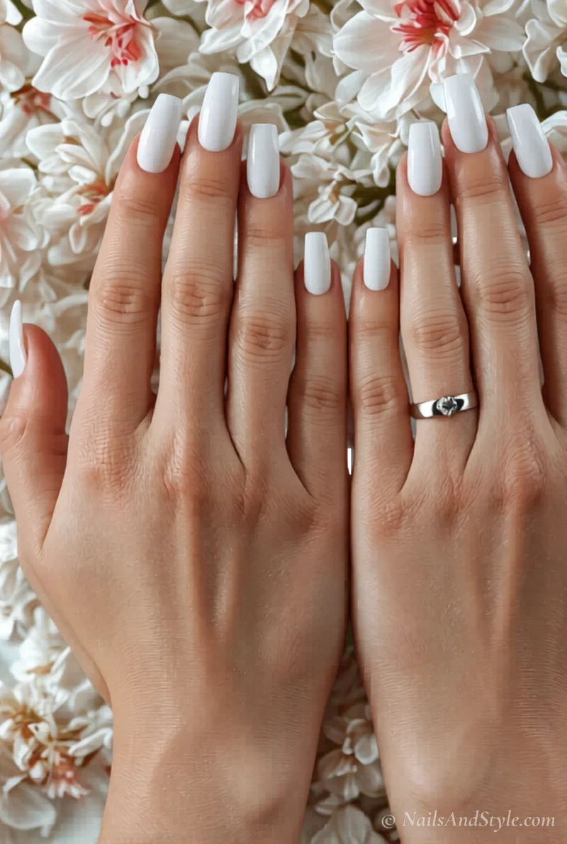 Milky white acrylic nails on coffin shape with glossy finish