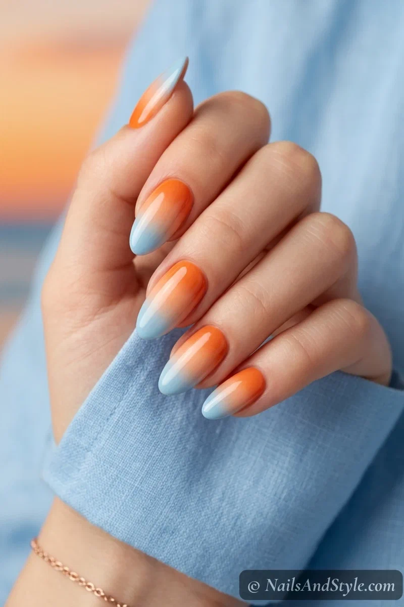 Tropical horizon fade nails with tangerine peach and sky blue gradient