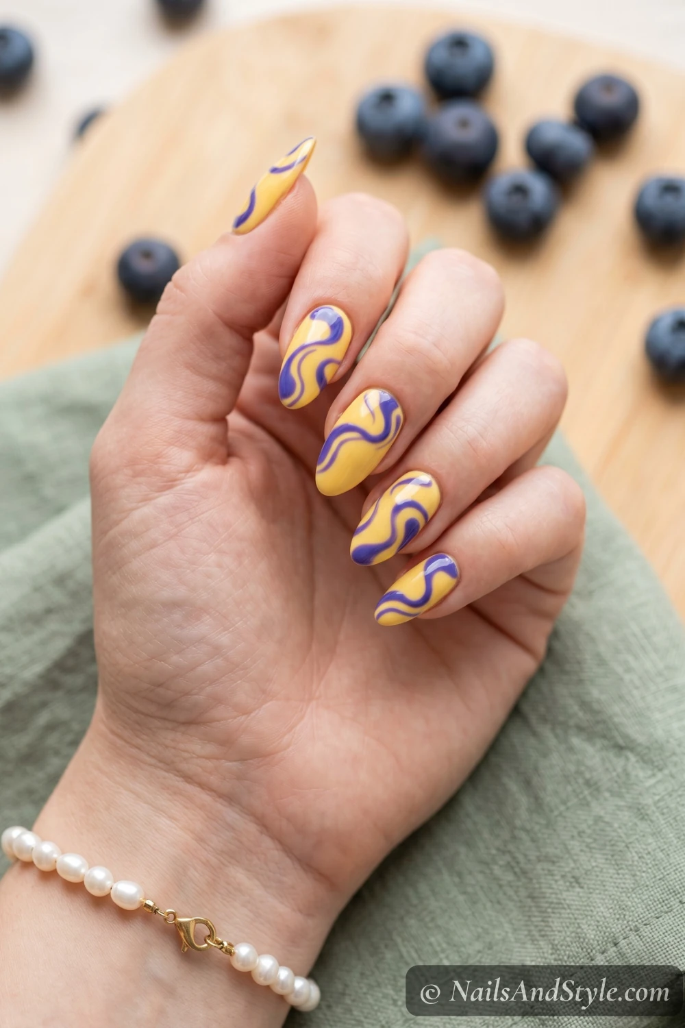 Blueberry swirls on a yellow base